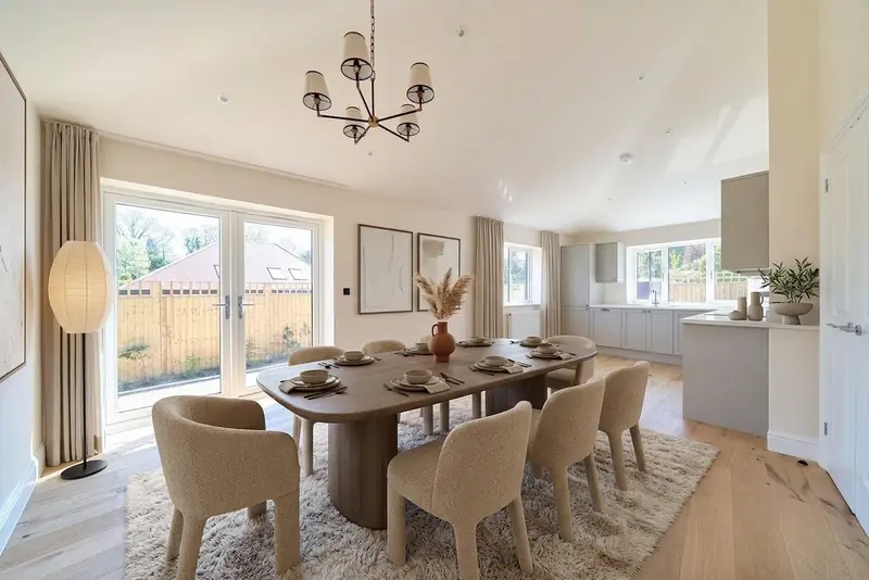 Open-plan dining area with doors to the garden
