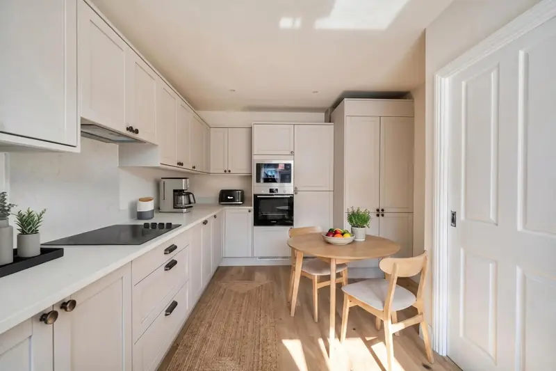 Shaker-style kitchen with integrated appliances