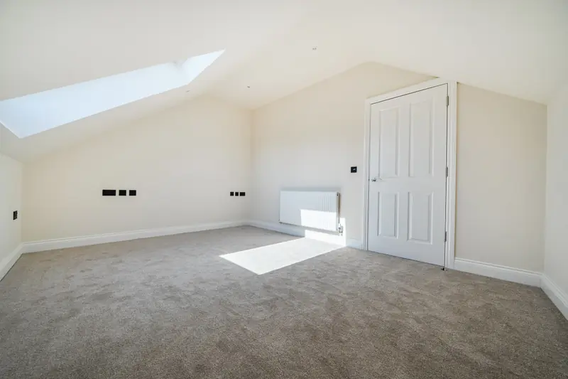 Second-floor bedroom with roof light