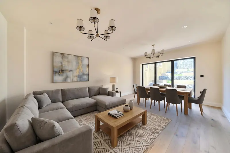 Living and dining room with doors to the rear garden