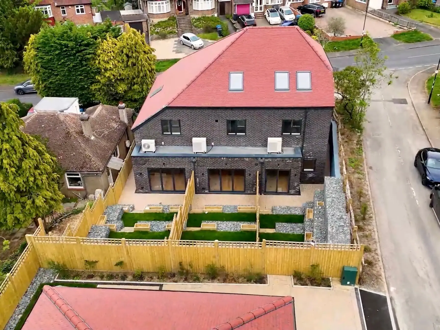 Aerial view of the terrace and its landscaped rear gardens